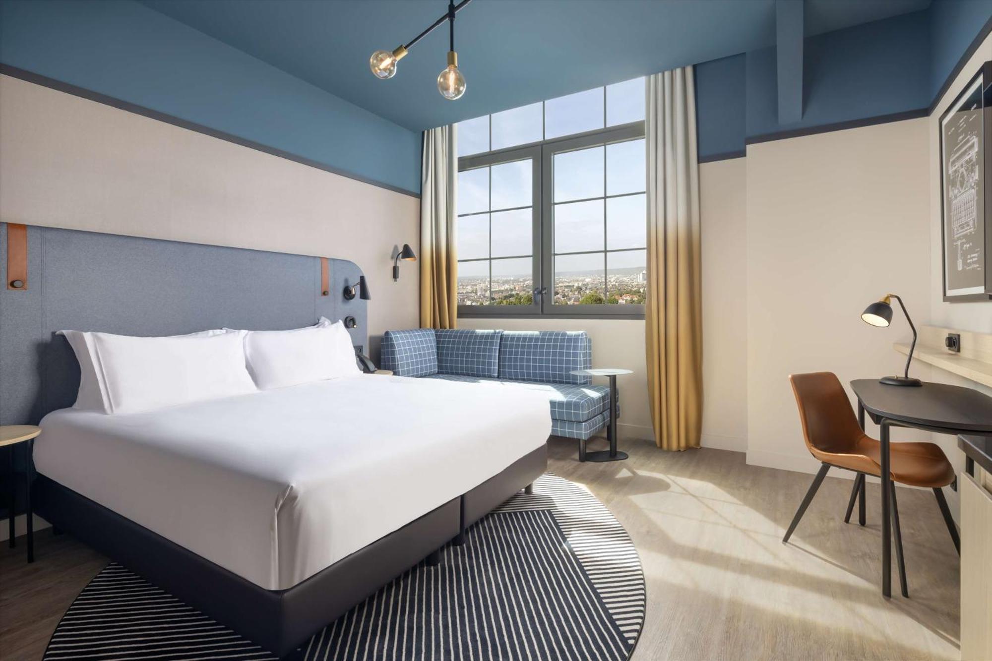 Chambre Lit King-Size Deluxe - Vue sur Ville